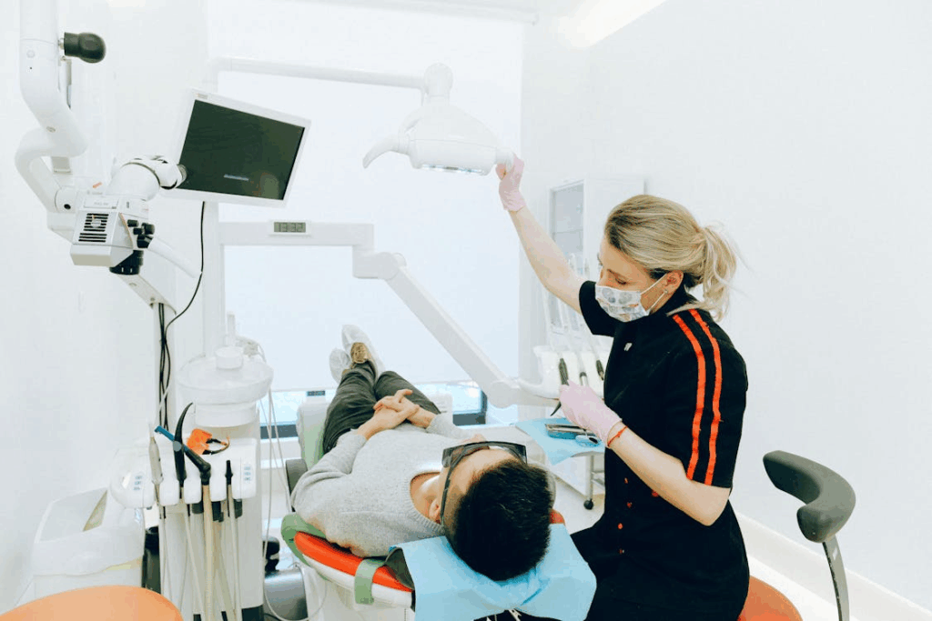 a dental professional tending to a patient
