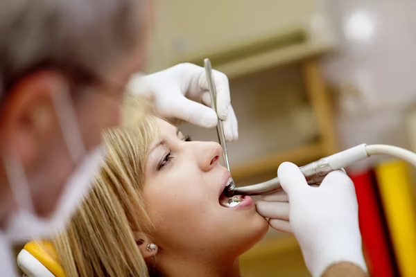 photo of a blonde woman during a dental exam